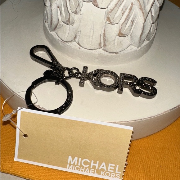 Michael Kors Accessories - Michael Kors Black and Silver Key Charm